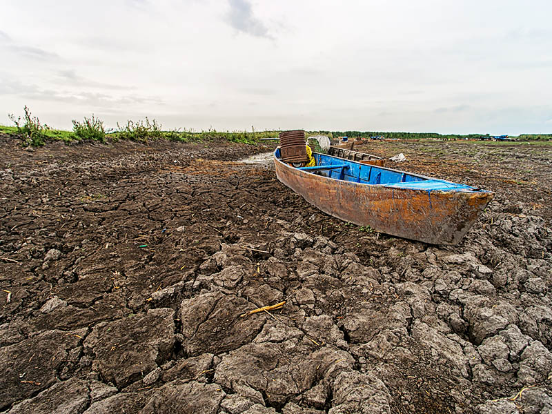Boat on dry lake in Turkey due to climate change